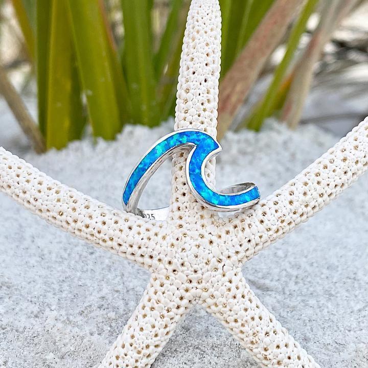 Anello a Onda in Argento con Opale Blu