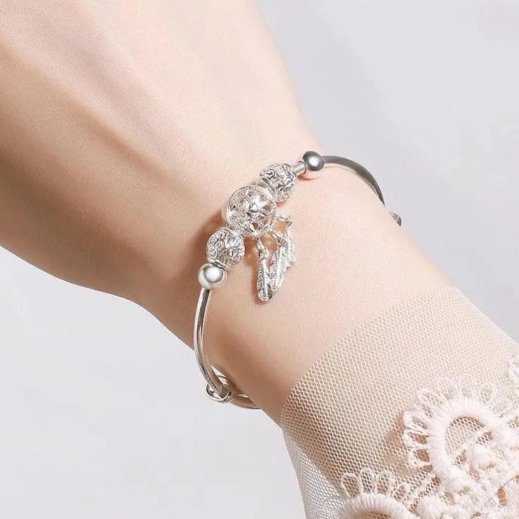 Bracciale Rigido Acchiappasogni in Argento