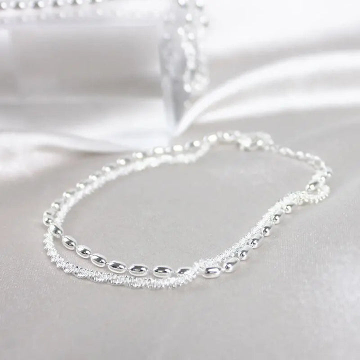 Set di bracciali eleganti in argento con pietre di zirconia